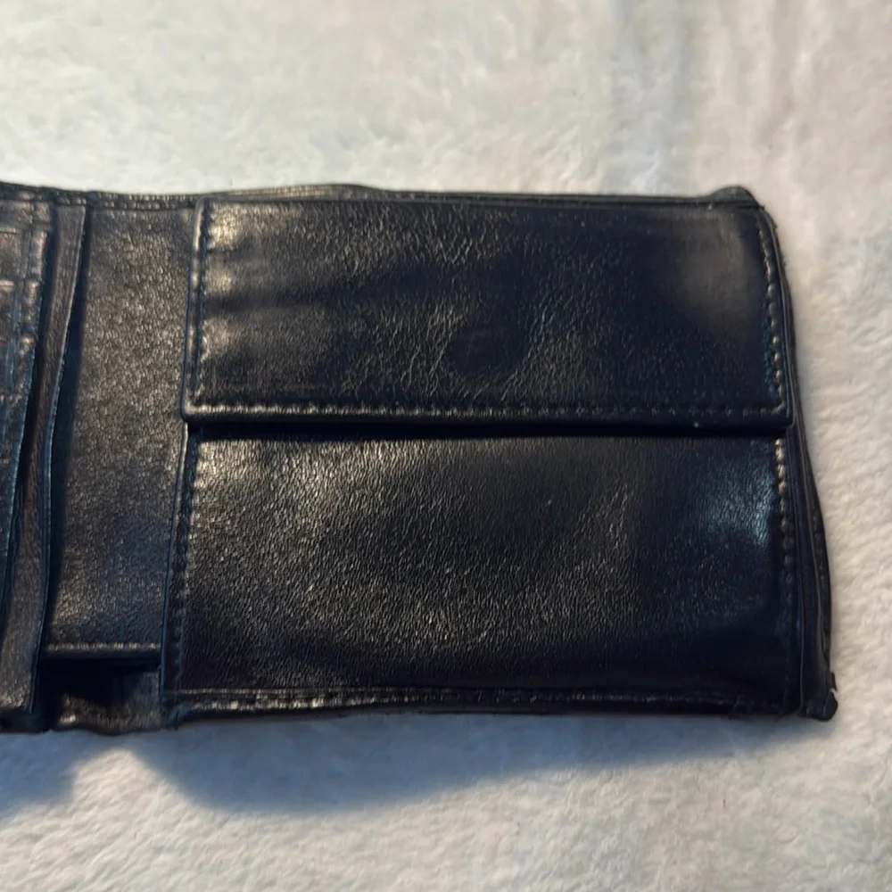 Salvador Ferragamo black bifold wallet.